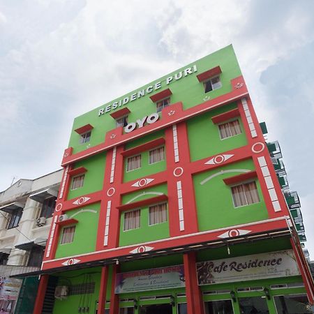 Capital O 615 Residence Puri Hotel Syariah ميدان المظهر الخارجي الصورة