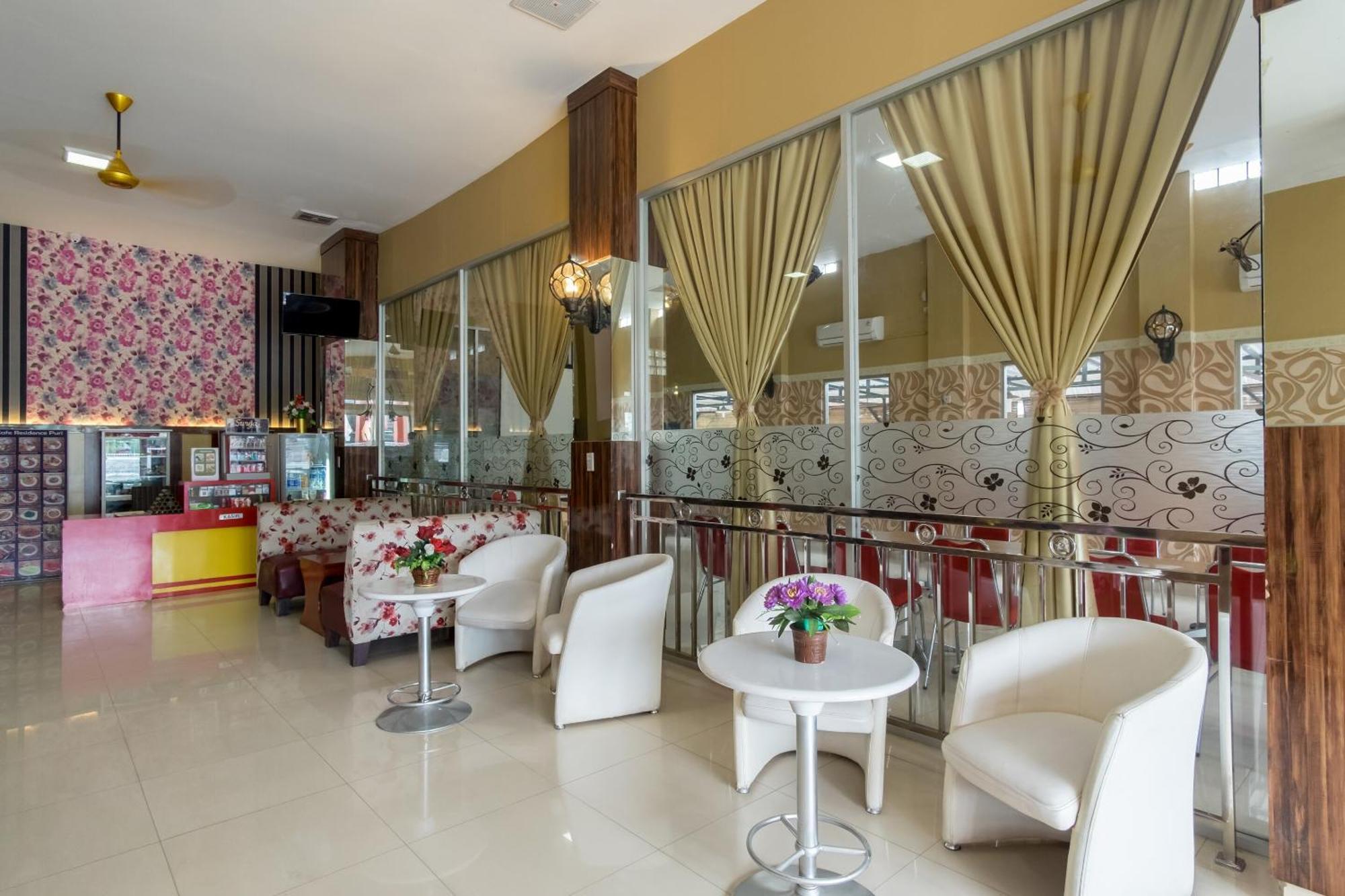 Capital O 615 Residence Puri Hotel Syariah ميدان المظهر الخارجي الصورة
